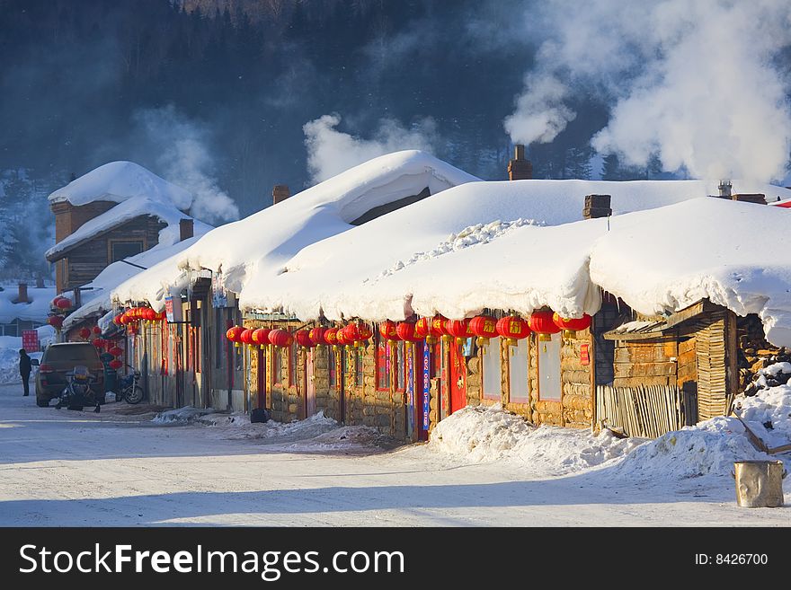 Houses  Covered In Snow,in Winter