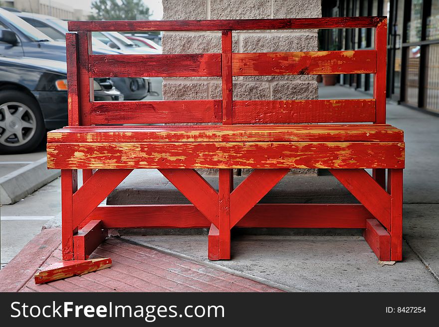 Red Bench in parking lot