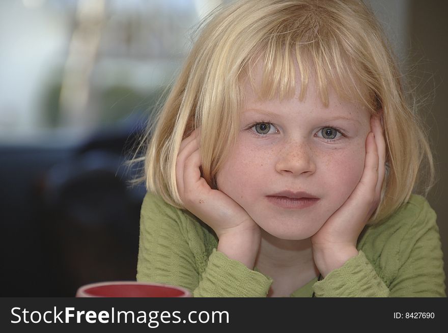 Portrait Of A Young Blond Girl