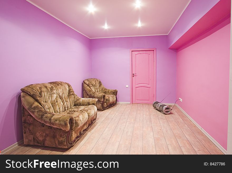 Pink room interior with sofa