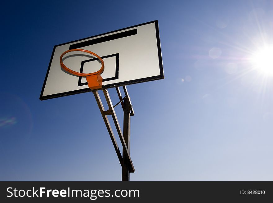 Up view of a basketball hoop.