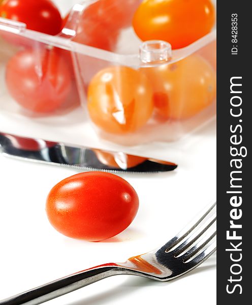 Fork And Knife With Cherry Tomato