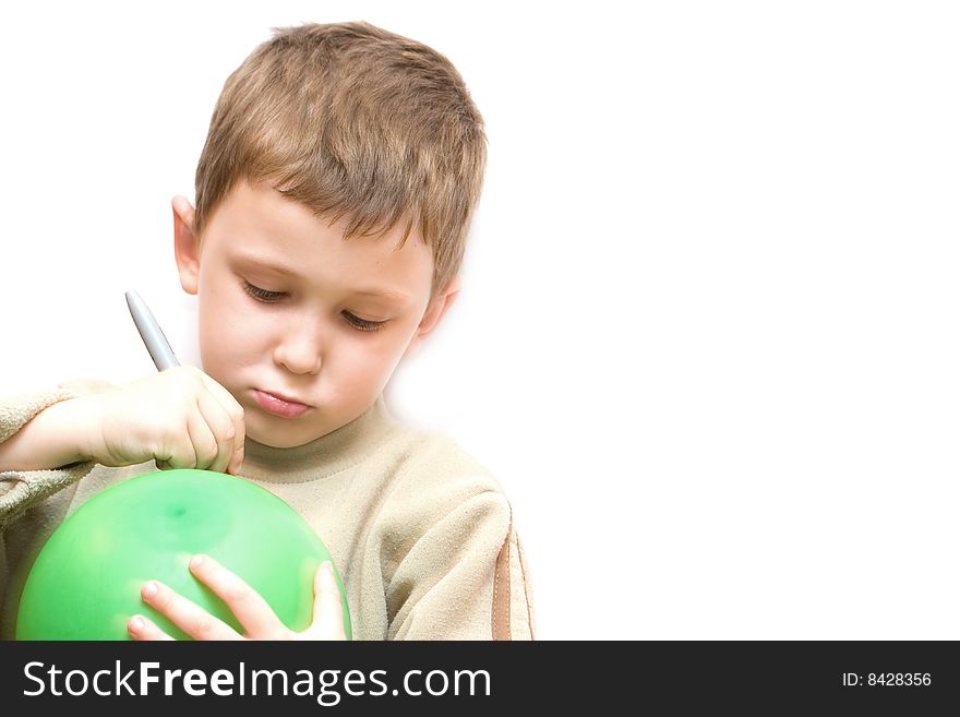 Little boy writing on the green ballon