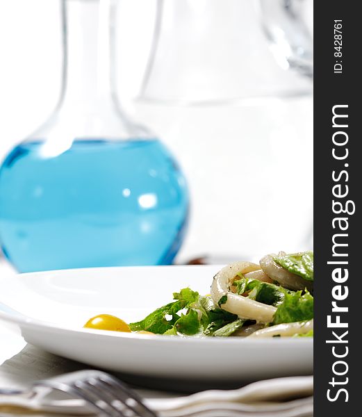 Seafood Salad with a Jug on a Background. Seafood Salad with a Jug on a Background