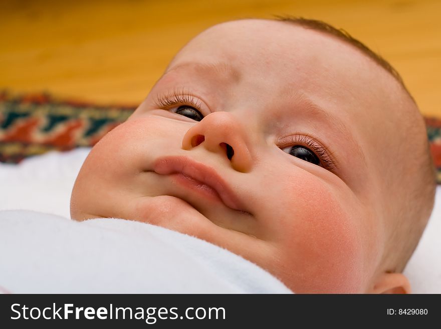 Caucasian infant making funny face