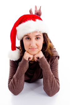 Female In Christmas Hat Lying On Floor Royalty Free Stock Images