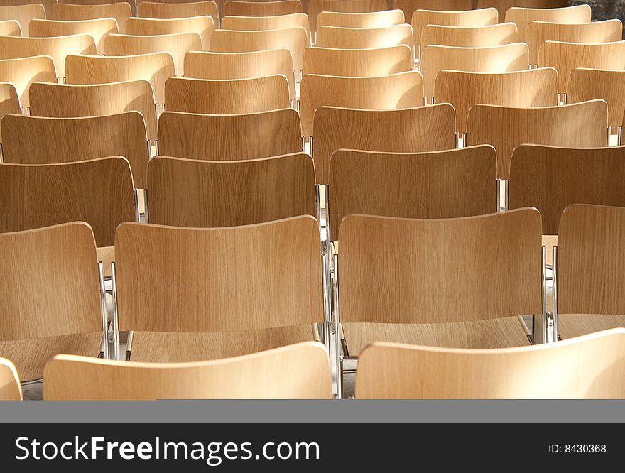 A group of chairs in an auditorium