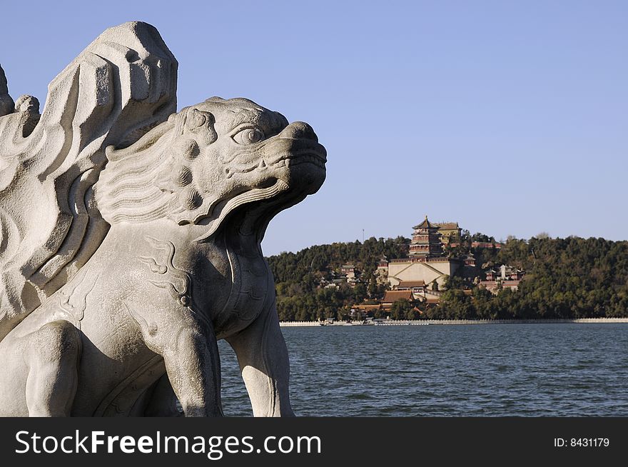 Stone lion statue and the park, ancient chinese park. Stone lion statue and the park, ancient chinese park