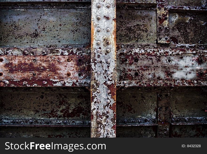 Century old iron decays in the shadows. Striking contrast and mood with deep textures and enhanced natural color pallet. Century old iron decays in the shadows. Striking contrast and mood with deep textures and enhanced natural color pallet.