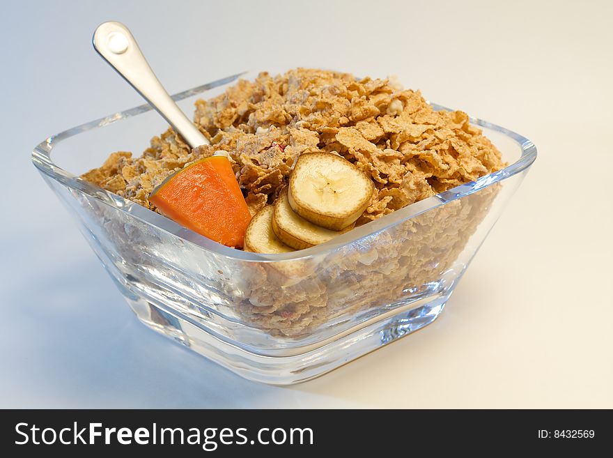 Bowl of healthy cereal with fruits for a nice breakfast. Bowl of healthy cereal with fruits for a nice breakfast