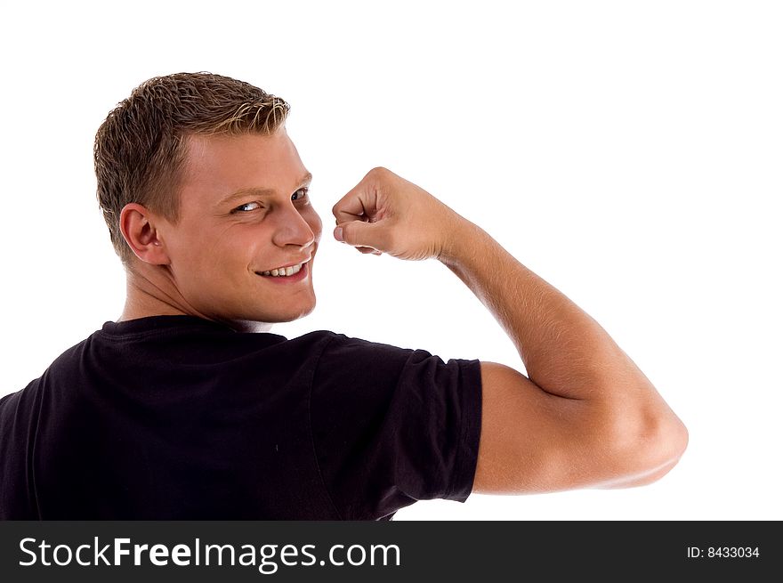 Back pose of muscular man showing muscles on an isolated background