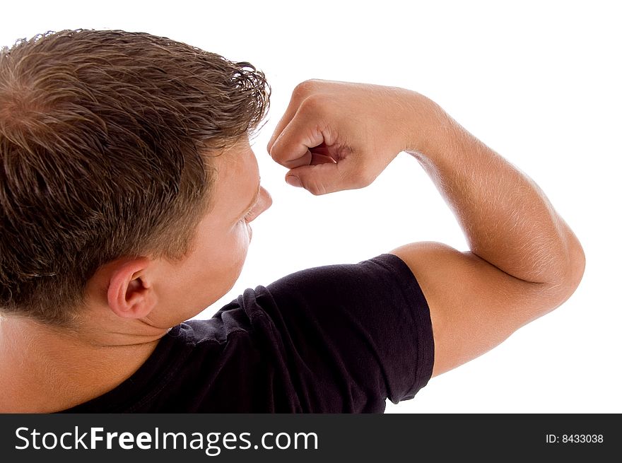 Back pose of man showing muscles with white background