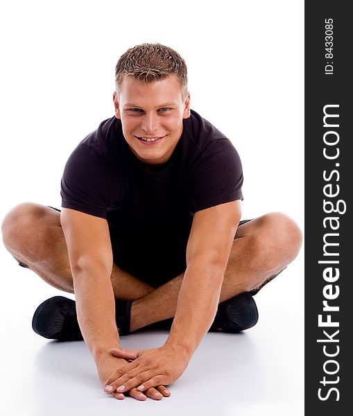 Resting muscular male on an isolated background