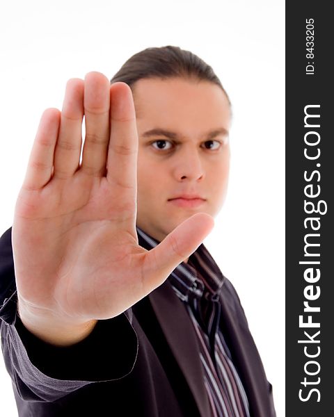Man showing stopping gesture on an isolated white background