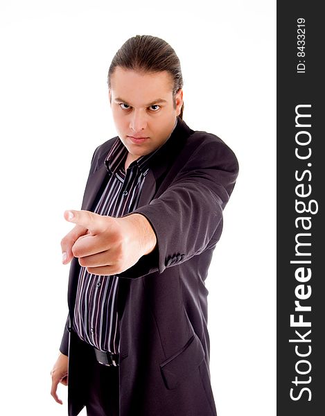 Angered businessman shouting in front of camera isolated on white background