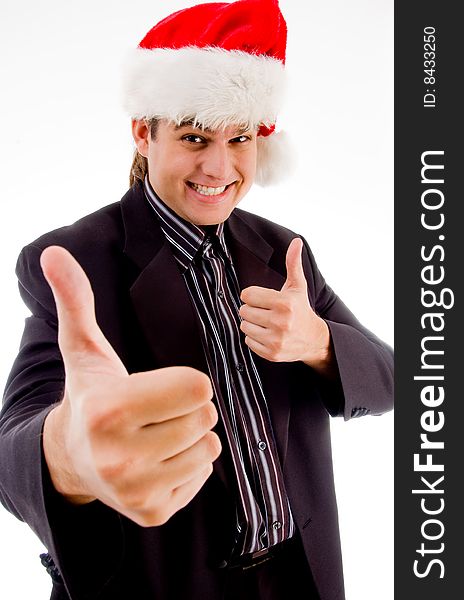 Man showing hand gesturing and wearing christmas hat against white background