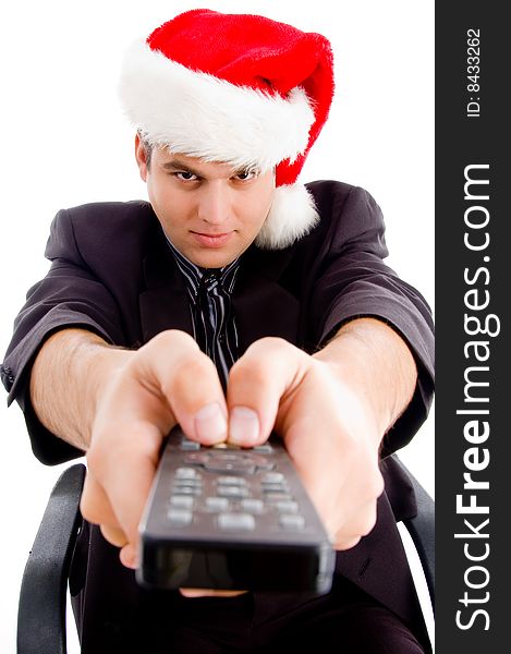 Man holding remote control and wearing christmas hat with white background. Man holding remote control and wearing christmas hat with white background