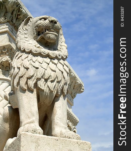 Very very fierce looking - a lion on a monument near the castle, in Budapest, Hungary. Very very fierce looking - a lion on a monument near the castle, in Budapest, Hungary.
