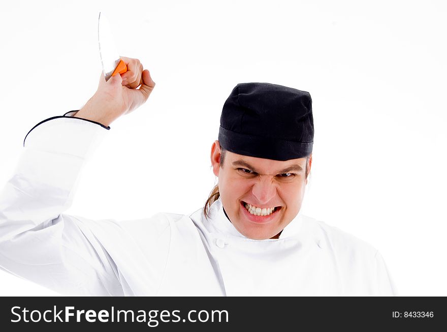 Male chef attacking with knife with white background