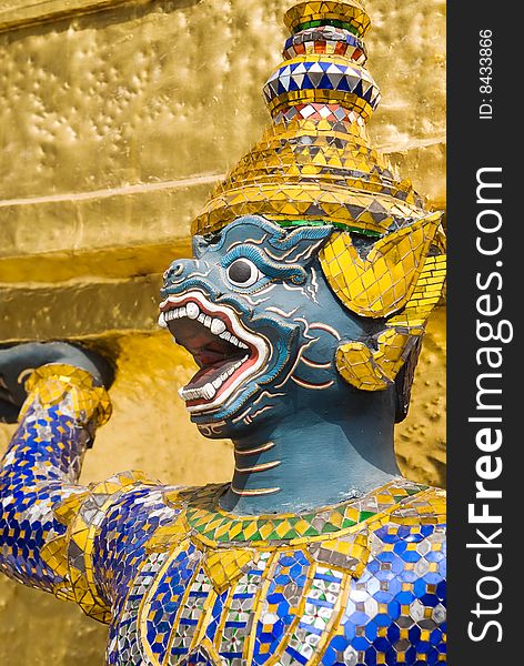 Mythic creature Rakshas statue at the Wat Phra Kaeo (Temple of Emerald Buddha), Bangkok, Thailand