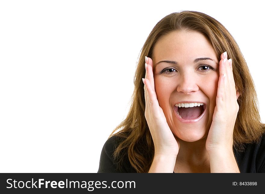 Closeup of an attractive woman holding her hands up to her face in surprise. Closeup of an attractive woman holding her hands up to her face in surprise.