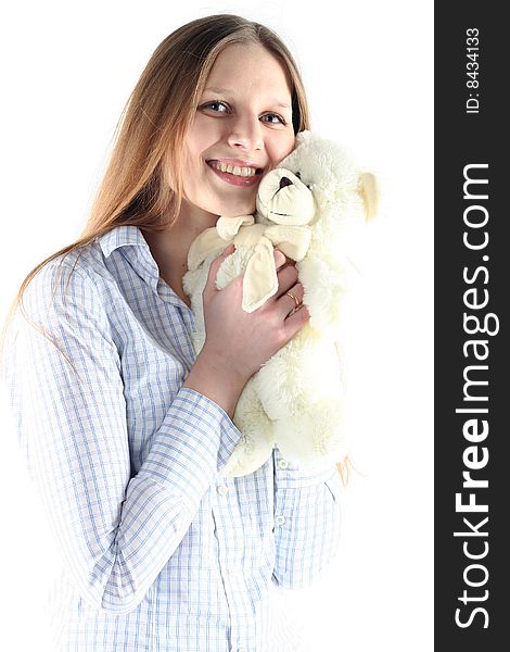 Portrait of young woman with teddy bear isolated on white backgrownd
