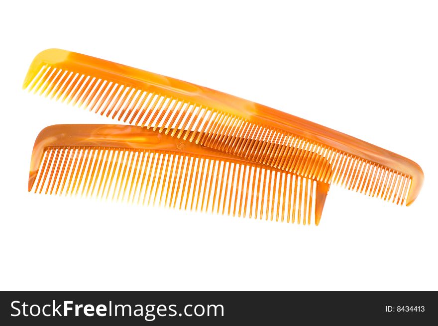 Two hairbrushes isolated on a white background