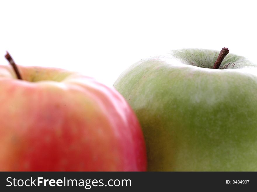 Red and yellow apples on white background