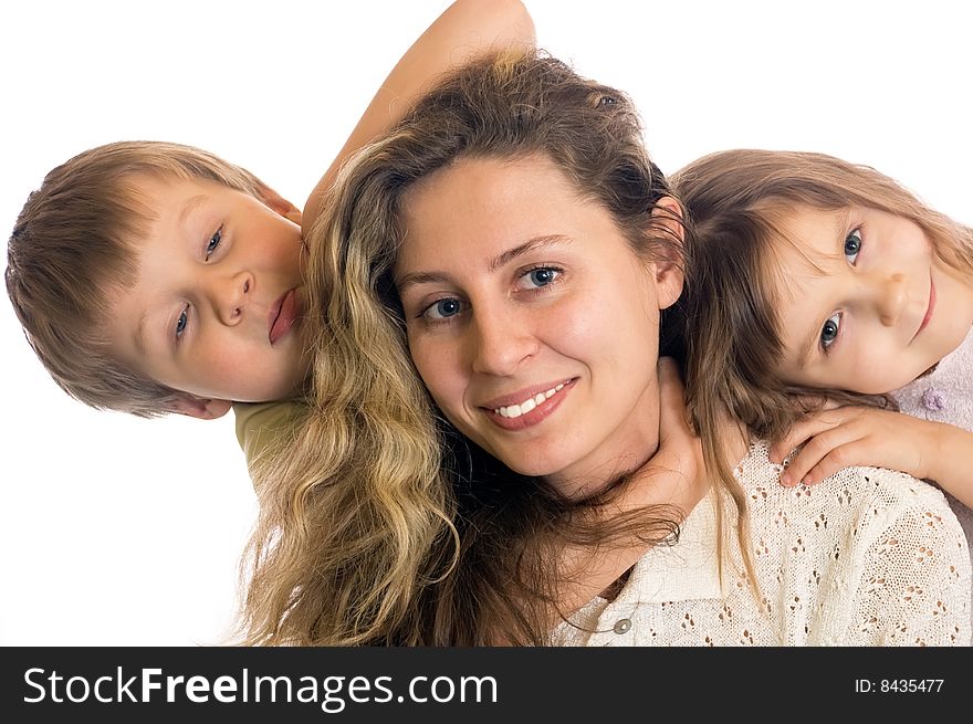 two kids and a young woman close to each other. two kids and a young woman close to each other