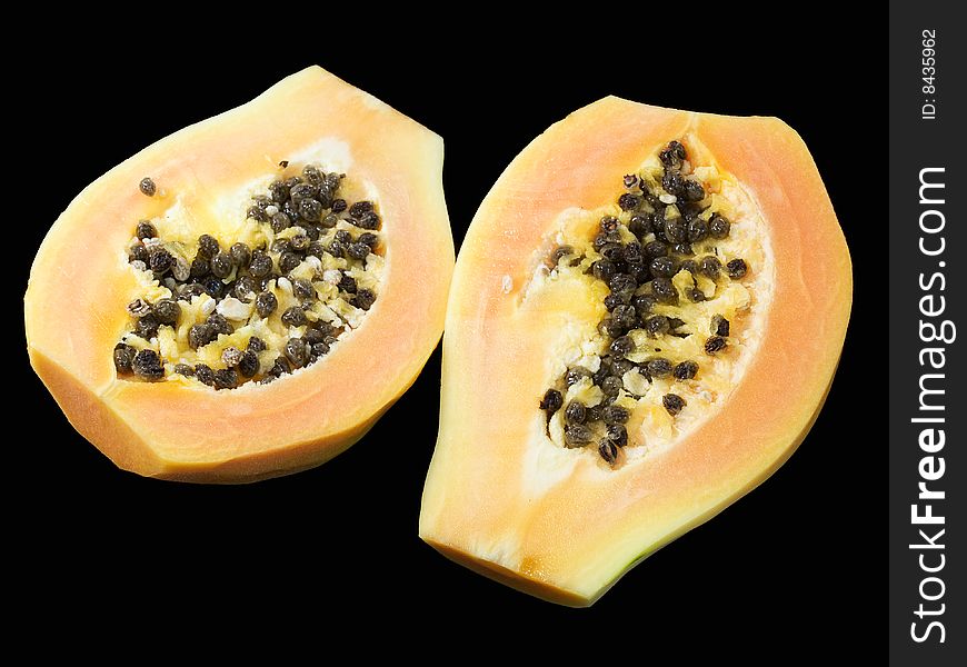 Papaya  isolated on a black background.