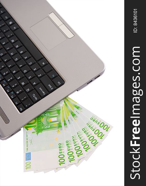 Money and laptop concept isolated in white background