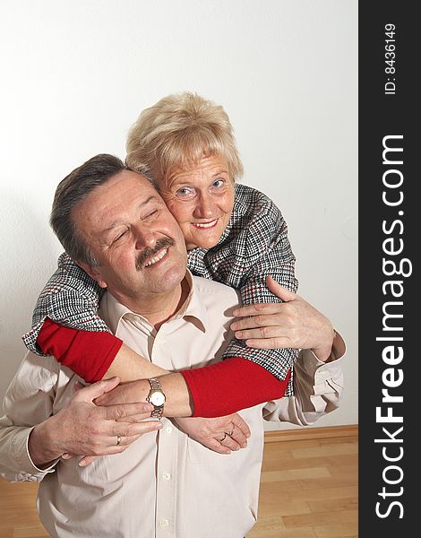 Happy old couple at home with copyspace. Happy old couple at home with copyspace.