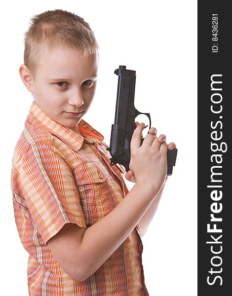 Boy with big gun isolated on a white background