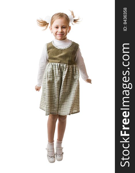 Little beautiful schoolgirl isolated on a white background. Little beautiful schoolgirl isolated on a white background