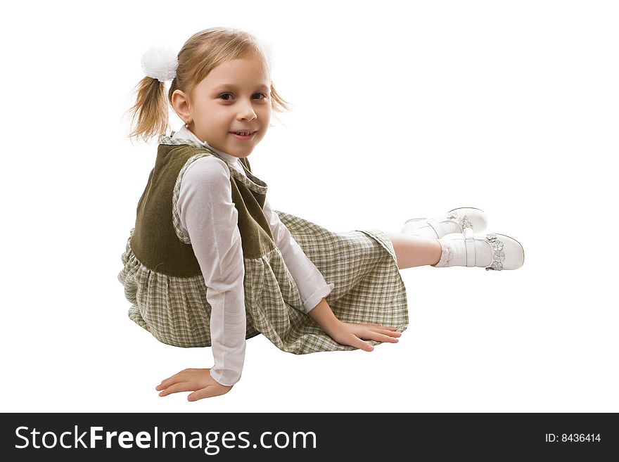 Little beautiful schoolgirl isolated on a white background. Little beautiful schoolgirl isolated on a white background