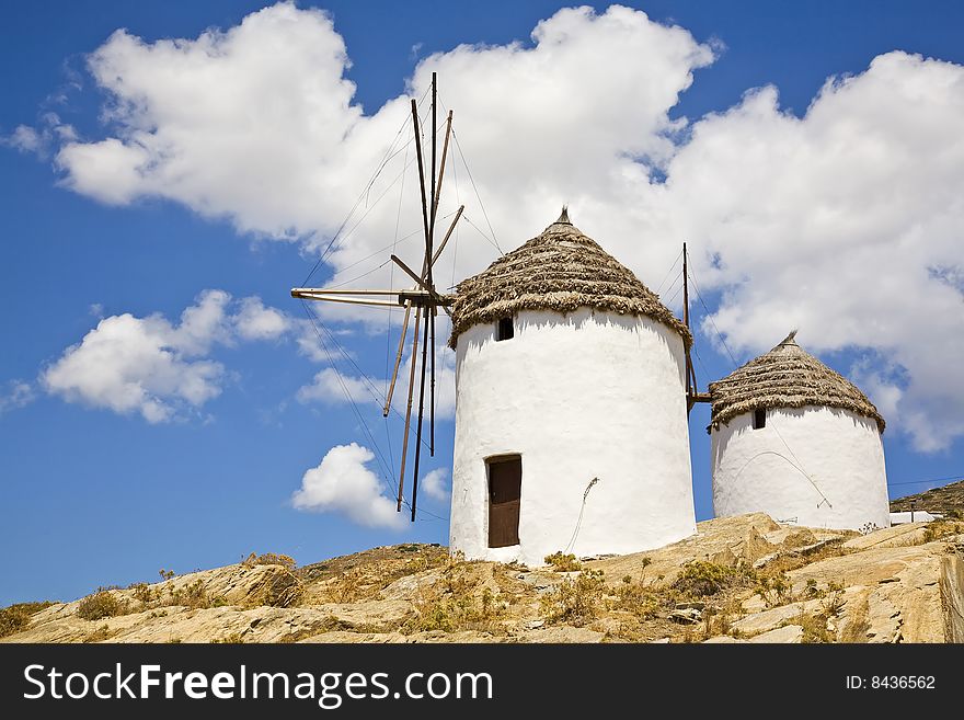 Two greek windmills on the island of Ios, Cyclades, Greece.