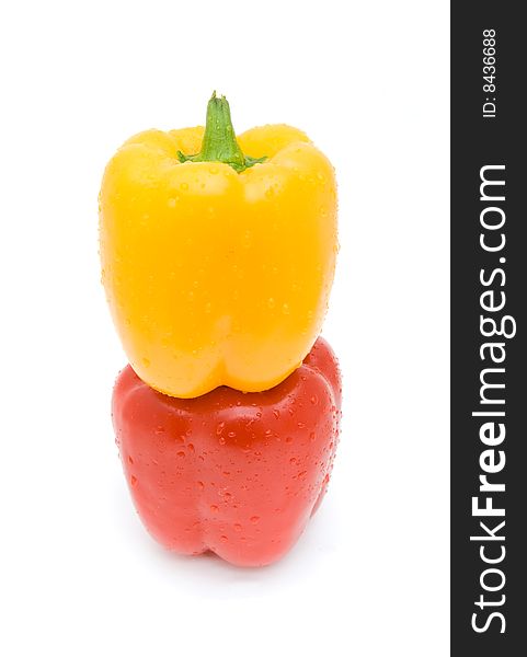 Red and yellow peppers isolated