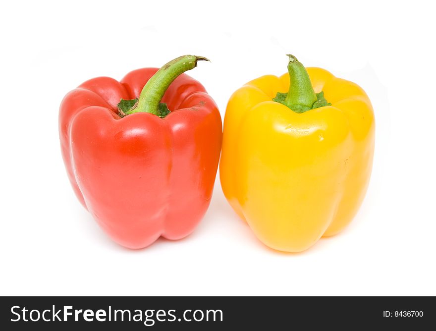 Red and yellow peppers isolated