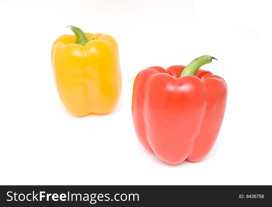 Two peppers isolated on white