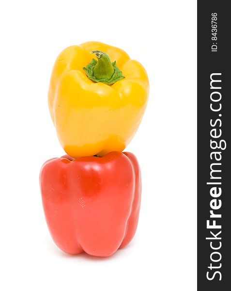 Red and yellow peppers isolated