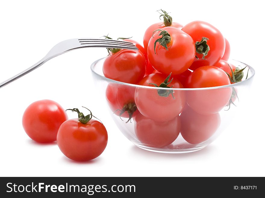 Ripe Tomatoes In Glass Bowl Isolated