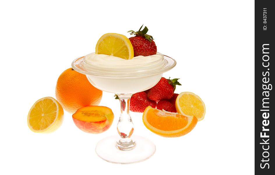 Fruits with cream in the glass