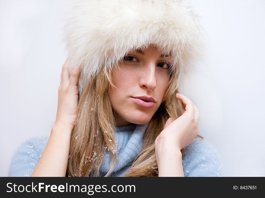 Portrait of girl in winter hat