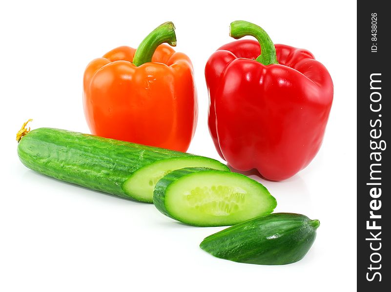 Fresh Vegetables (paprika and cucumber) isolated on a white background. Shot in a studio.