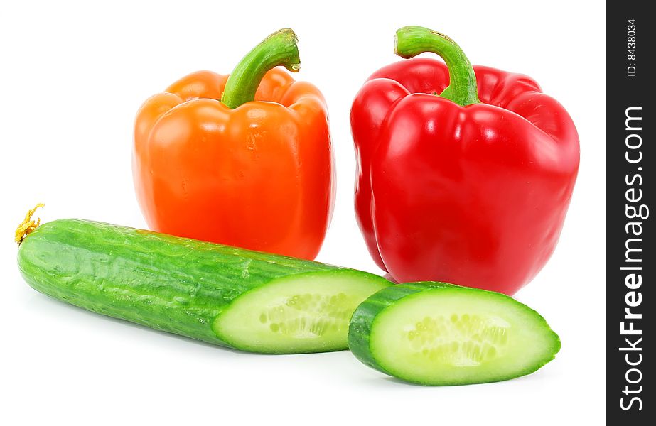 Fresh Vegetables (paprika and cucumber) isolated on a white background. Shot in a studio.