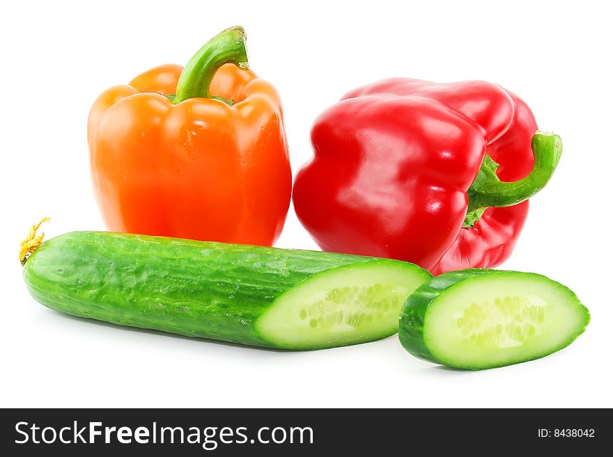Fresh Vegetables (paprika and cucumber) isolated on a white background. Shot in a studio.