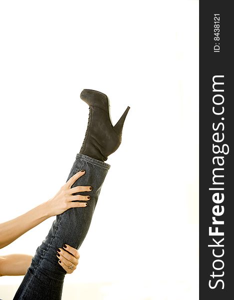 Leg of woman wearing high heel boot. Leg of woman wearing high heel boot