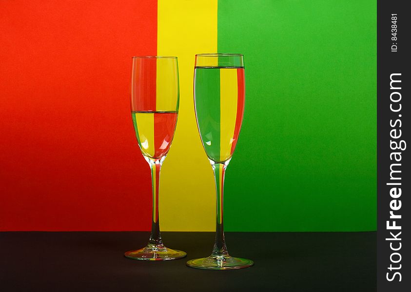 Two Wineglass In Color Background