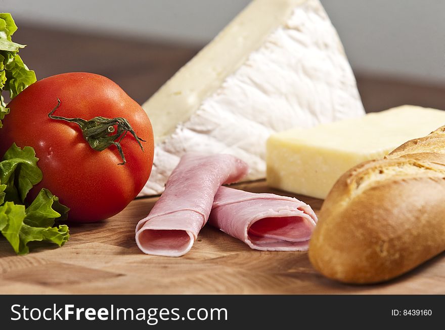 Rustic french baguete with ham and cheese. Rustic french baguete with ham and cheese