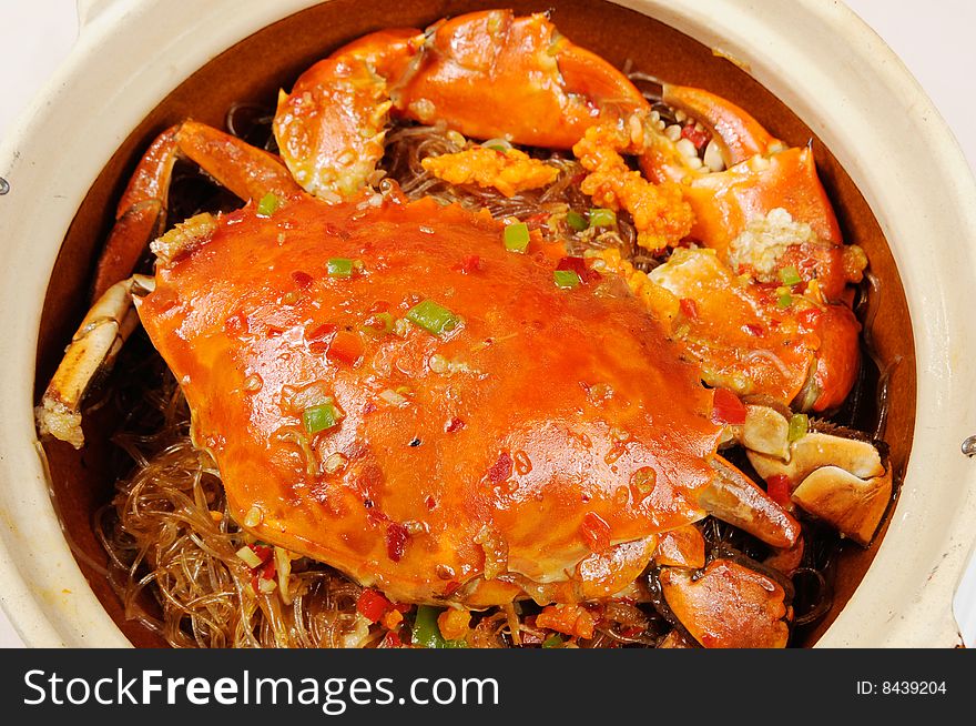 An Chinese fried crab on white dish